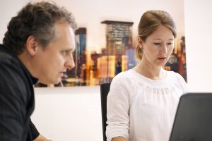 working together at one desk