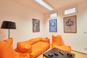 orange beanbags in xbox room